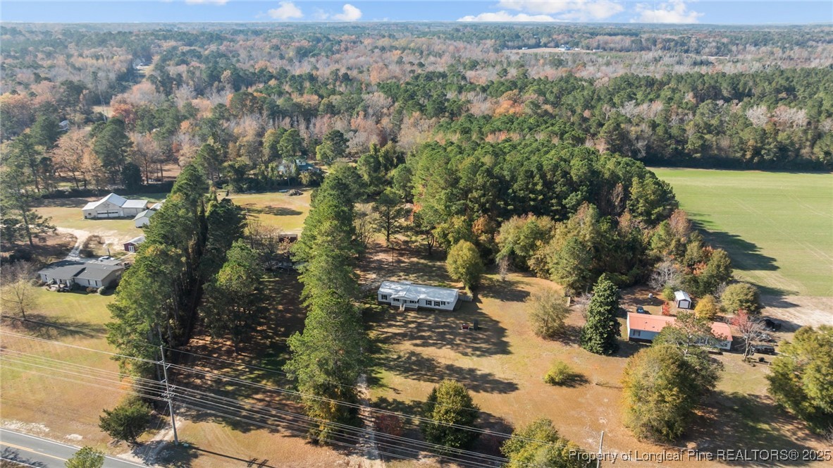 5888 Butler Nursery Road Fayetteville, NC 28306 - Photo 38 of 42 a view of a lake with houses