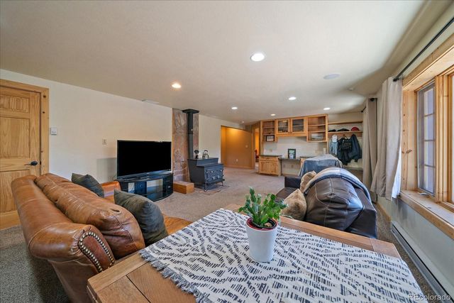 a view of a large tree with a yard