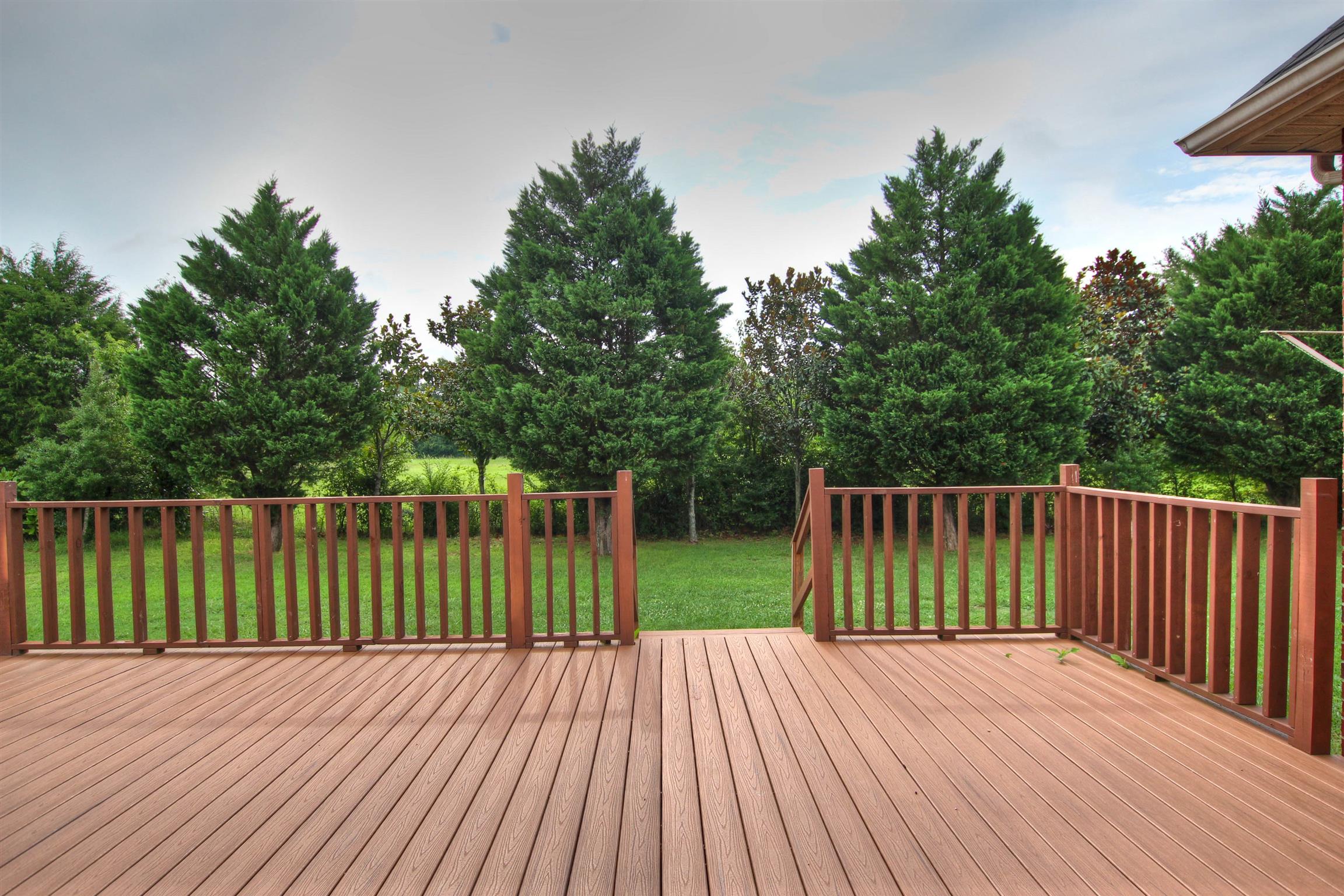 225 Conquest Road Murfreesboro, TN 37128 - Photo 20 of 21 Plenty to room to entertain on this spacious deck. Home backs up to treeline.