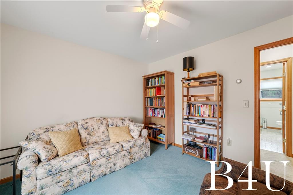 442 Fox Road Otego, NY 13825 - Photo 15 of 40 a living room with furniture and a chandelier