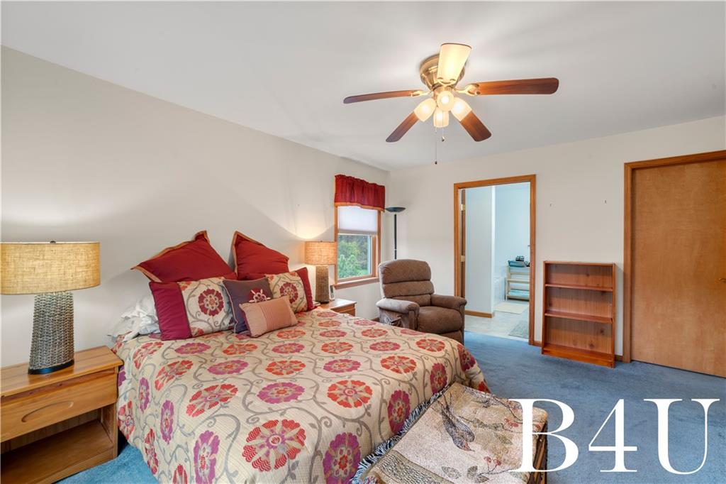 442 Fox Road Otego, NY 13825 - Photo 22 of 40 a bedroom with a bed and wooden floor