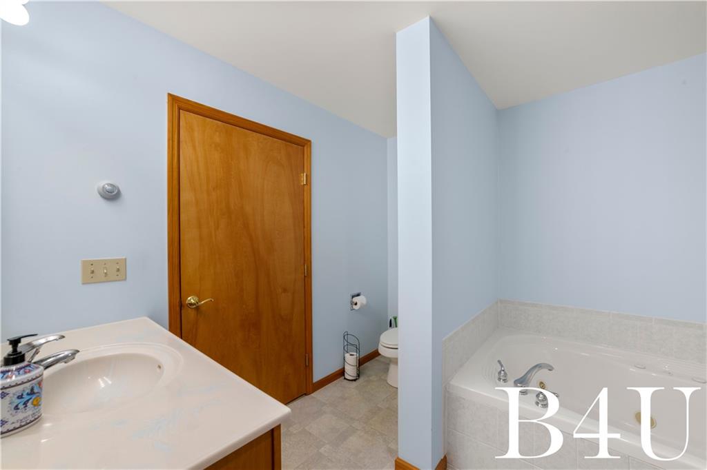 442 Fox Road Otego, NY 13825 - Photo 24 of 40 a bathroom with a tub and sink