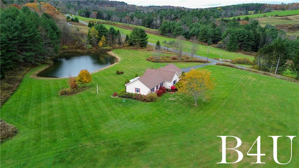 442 Fox Road Otego, NY 13825 - Photo 38 of 40 a swimming pool with trees in the background
