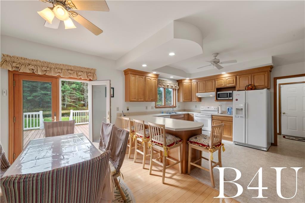 442 Fox Road Otego, NY 13825 - Photo 8 of 40 a view of a dining room with furniture