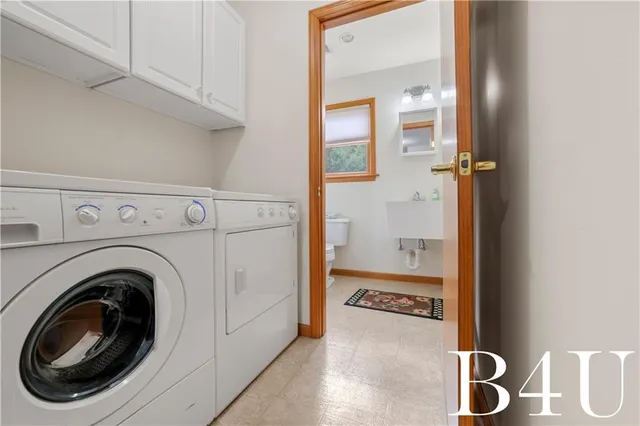 a bathroom with a sink vanity and a mirror