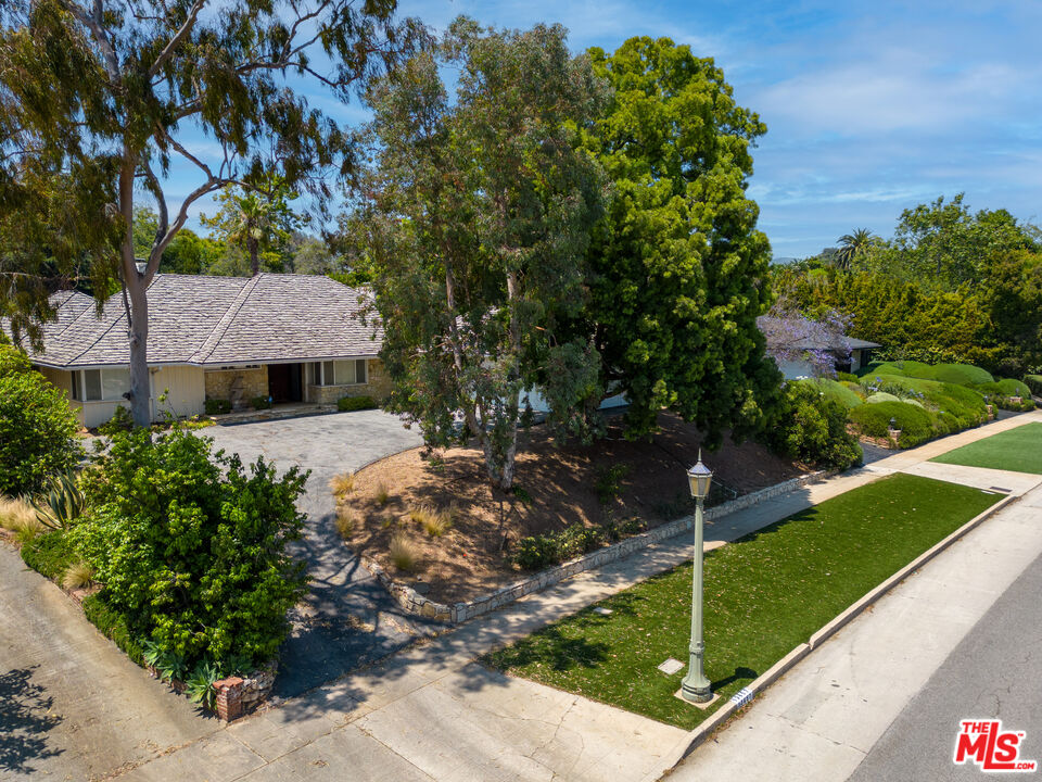 13657 Sunset Boulevard Pacific Palisades, CA 90272 - Photo 2 of 10 a view of house with garden space and street view