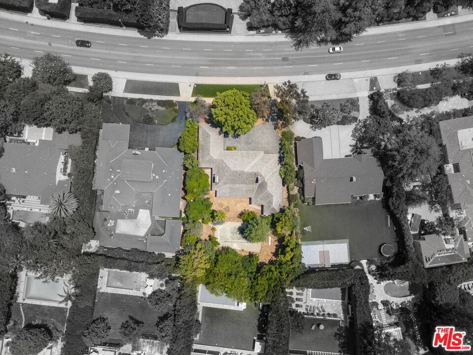 13657 Sunset Boulevard Pacific Palisades, CA 90272 - Photo 8 of 10 an aerial view of a house with a yard