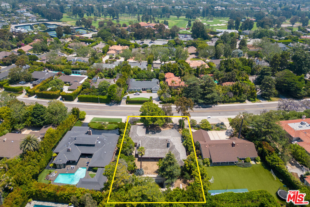 13657 Sunset Boulevard Pacific Palisades, CA 90272 - Photo 9 of 10 an aerial view of residential houses with outdoor space and parking