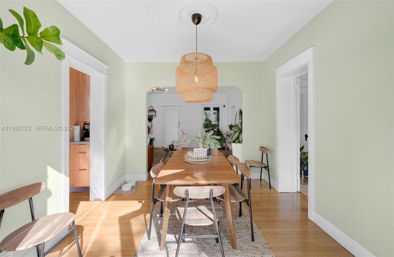 970 Northwest 10th Avenue Miami, FL 33136 - Photo 13 of 34 a view of a dining room with furniture and wooden floor