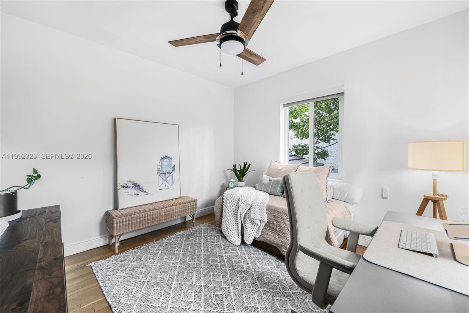 970 Northwest 10th Avenue Miami, FL 33136 - Photo 22 of 34 a bedroom with furniture and a window