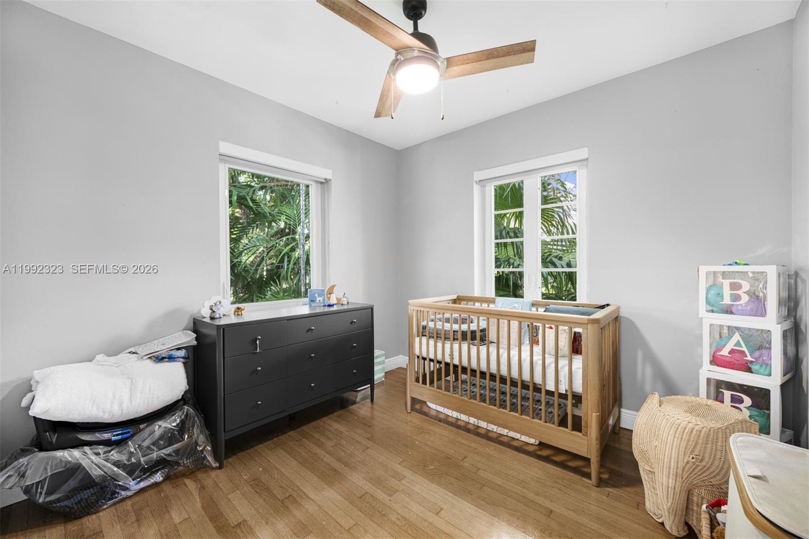 970 Northwest 10th Avenue Miami, FL 33136 - Photo 23 of 34 a bedroom with a bed and a window