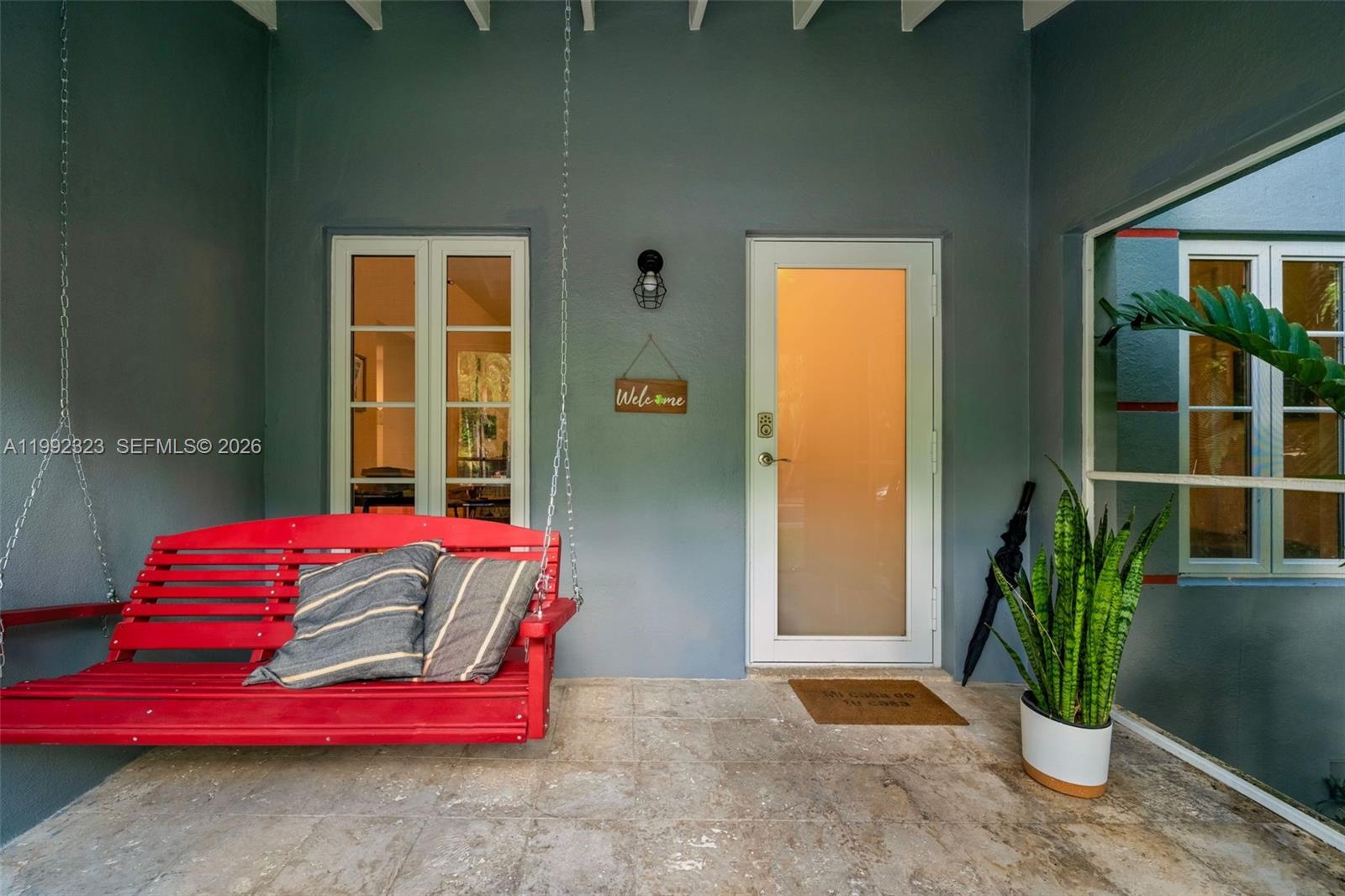 970 Northwest 10th Avenue Miami, FL 33136 - Photo 33 of 34 a bedroom with a bed and potted plant