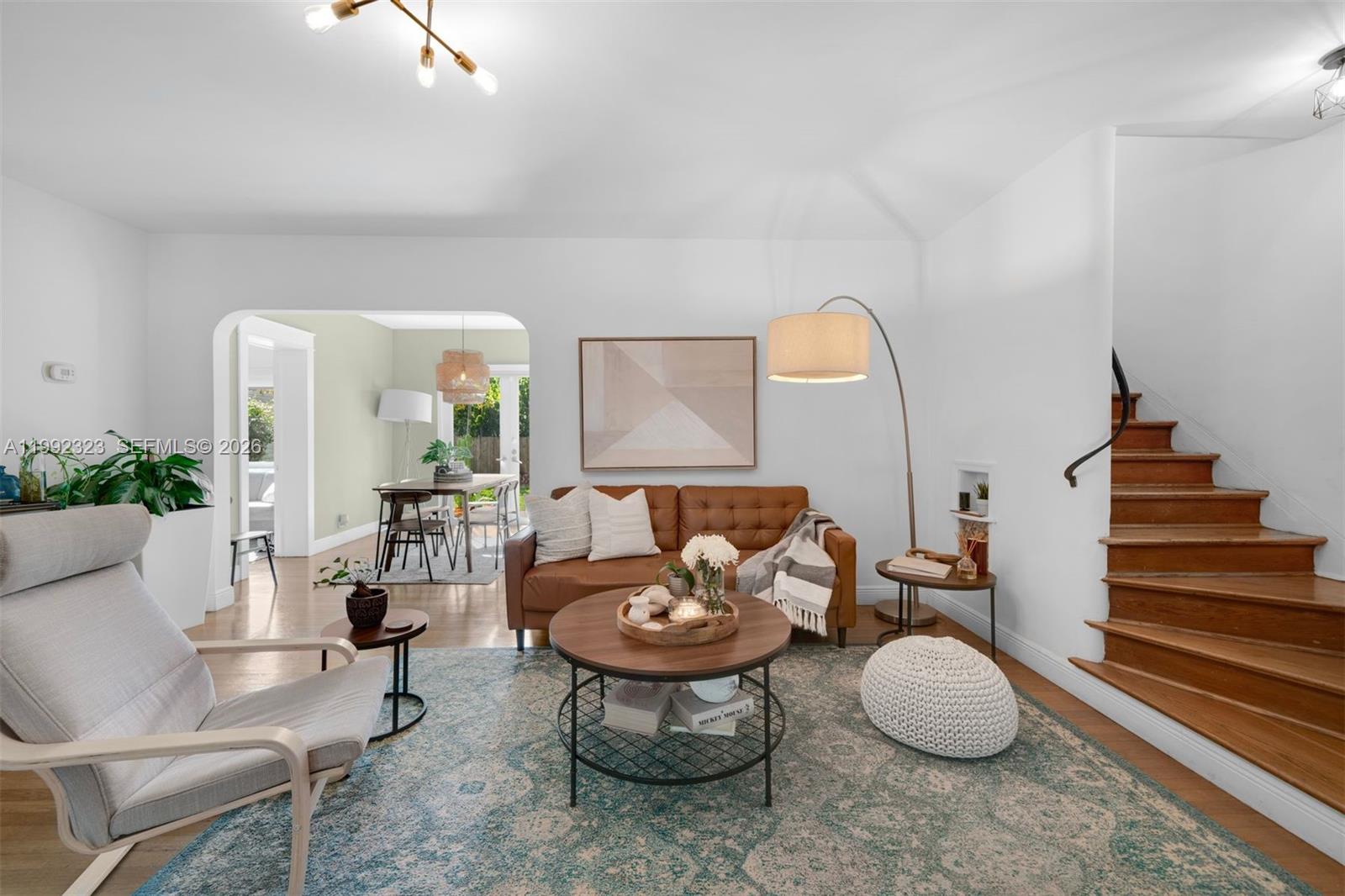 970 Northwest 10th Avenue Miami, FL 33136 - Photo 6 of 34 a living room with furniture and a mirror