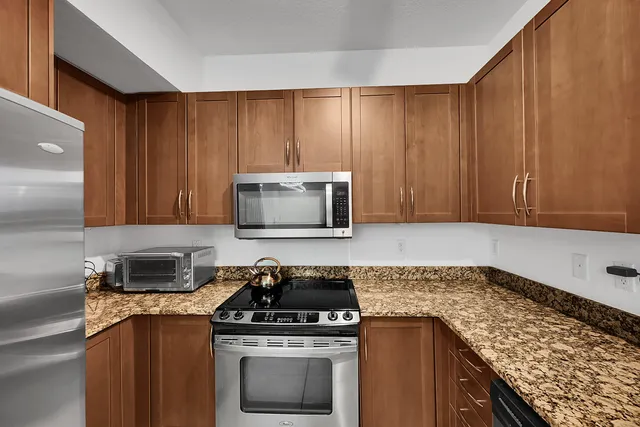 a kitchen with a stove and a sink