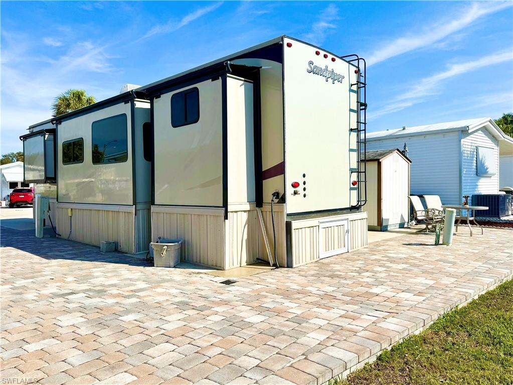 564 Cattleya Refuge, Unit 564 Naples, FL 34114 - Photo 6 of 50 a view of a house with a outdoor space