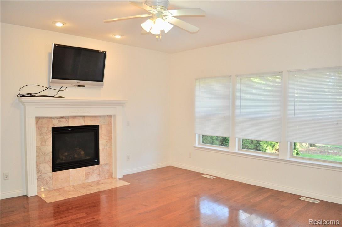19751 Gill Road Livonia, MI 48152 - Photo 7 of 21 Family Room with Hardwood Flooring