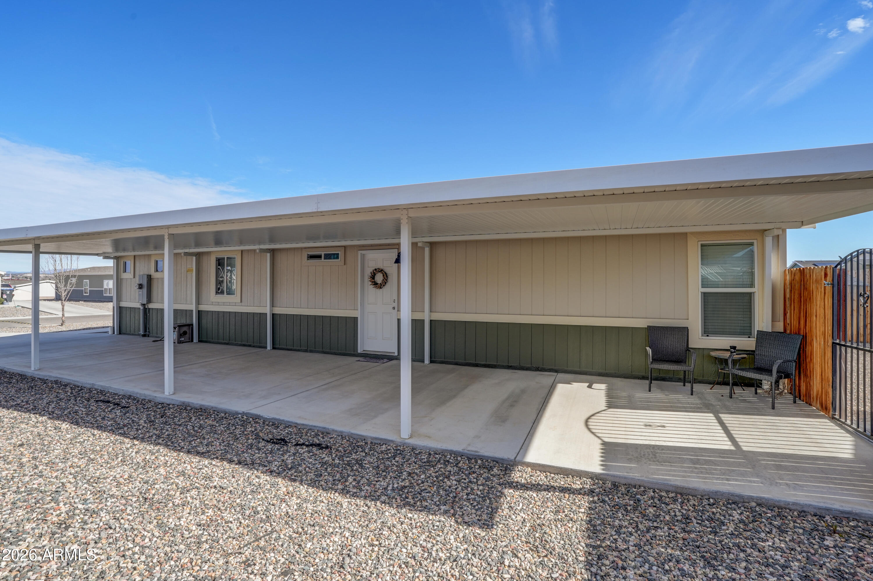 1159 Wheeler Road Camp Verde, AZ 86322 - Photo 13 of 13 a living room with a couch and a rug