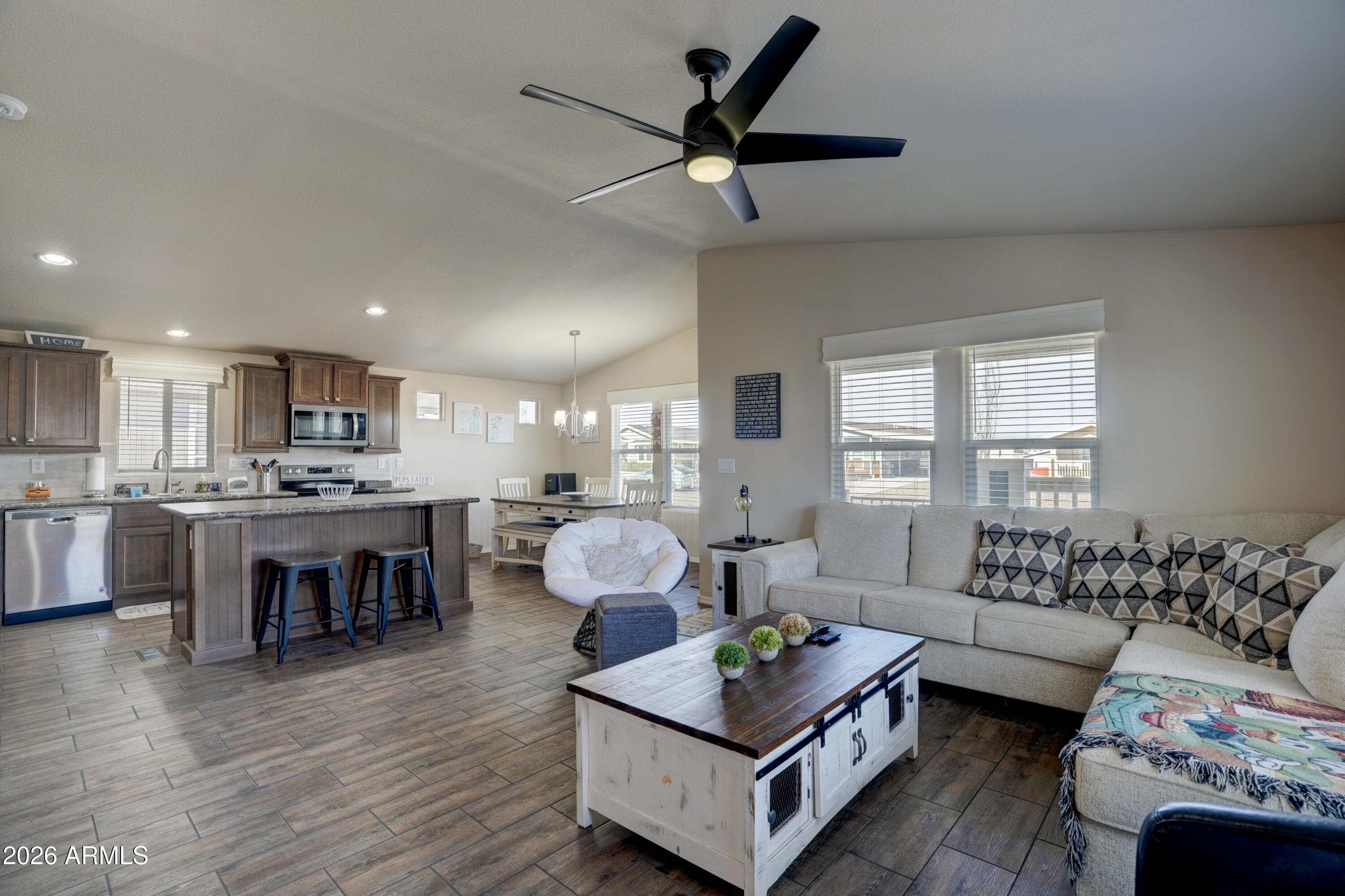 1159 Wheeler Road Camp Verde, AZ 86322 - Photo 9 of 13 a living room with furniture and a wooden floor