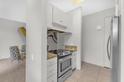 a view of livingroom with furniture and front door