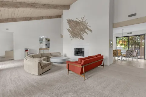 a outdoor space with furniture and large windows