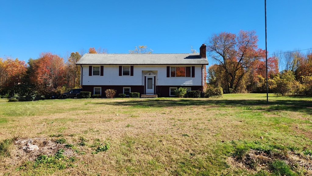 62 Millville Road Mendon, MA 01756 - Photo 1 of 10 a front view of a house with a yard