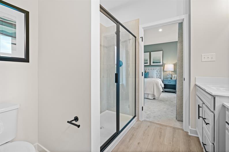 8020 Chief Way Mars, PA 16046 - Photo 12 of 18 a en suite bathroom with a toilet mirror and a shower