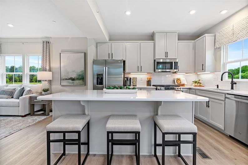 8020 Chief Way Mars, PA 16046 - Photo 2 of 18 a kitchen with appliances a center island and furniture