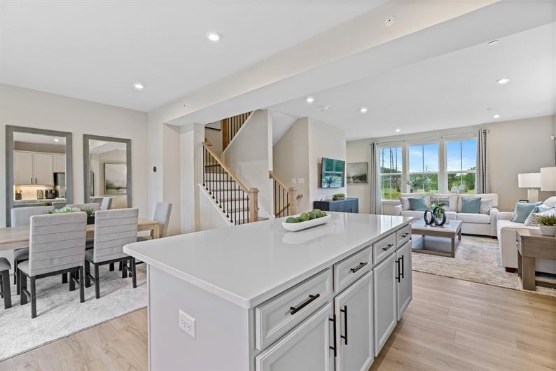 8020 Chief Way Mars, PA 16046 - Photo 5 of 18 a open kitchen with stainless steel appliances granite countertop a lot of counter space wooden floor and furniture