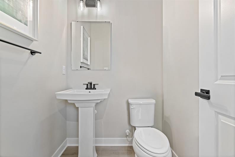 8020 Chief Way Mars, PA 16046 - Photo 8 of 18 a bathroom with a toilet a sink and mirror