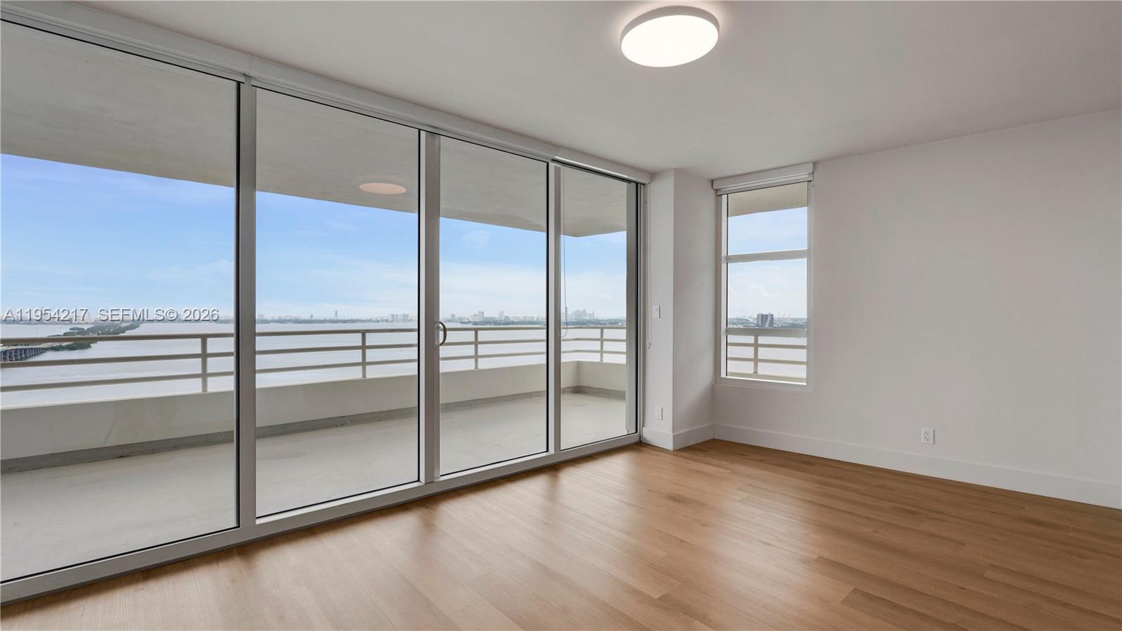 555 Northeast 34th Street, Unit 2201 Miami, FL 33137 - Photo 11 of 46 a view of an empty room and window