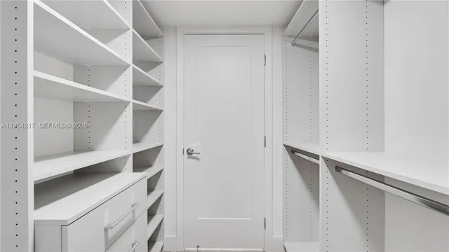 a bathroom with a sink and vanity