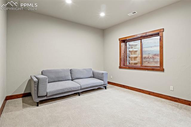7115 Wildridge Road Colorado Springs, CO 80908 - Photo 47 of 49 Lower level bedroom 5