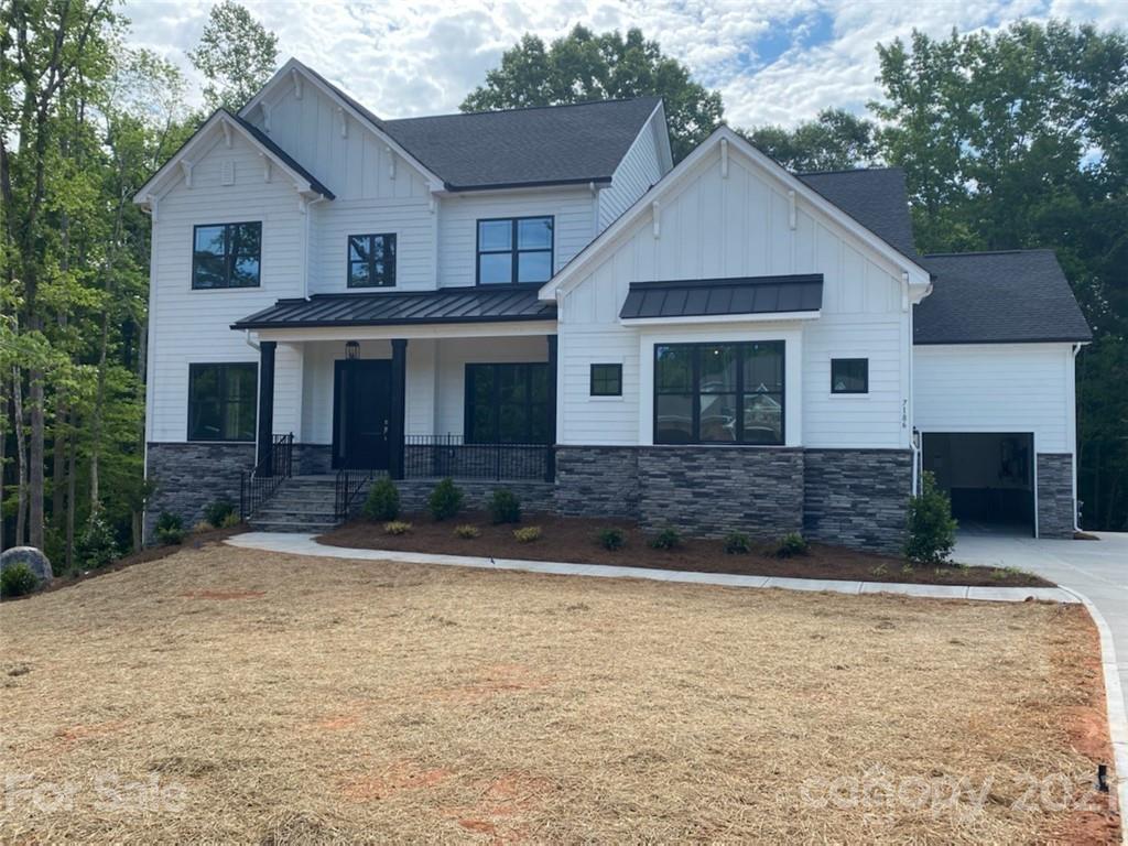7186 Three Kings Road Fort Mill, SC 29715 - Photo 1 of 1 a front view of a house with garage