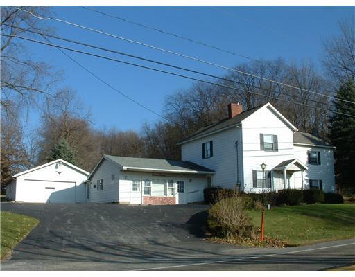 Exterior Front. 4 bedrooms, 2baths, Equipped eat-in kitchen.