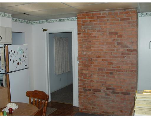 1814 Pulaski Road New Castle, PA 16105 - Photo 3 of 18 Kitchen. Wall in the kitchen, white cupboards and appliances
