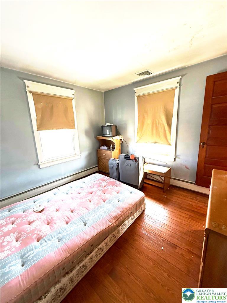 935 Easton Road Hellertown, PA 18055 - Photo 18 of 29 a bedroom with bed and window