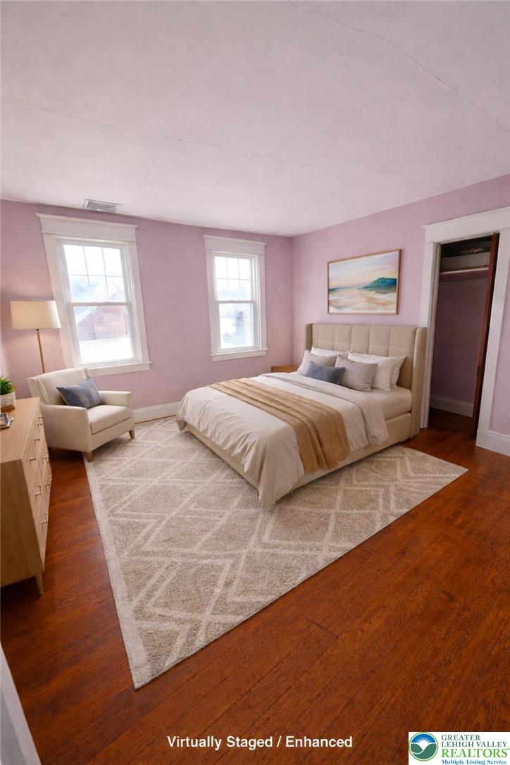 935 Easton Road Hellertown, PA 18055 - Photo 24 of 29 a bedroom with a bed and wooden floor