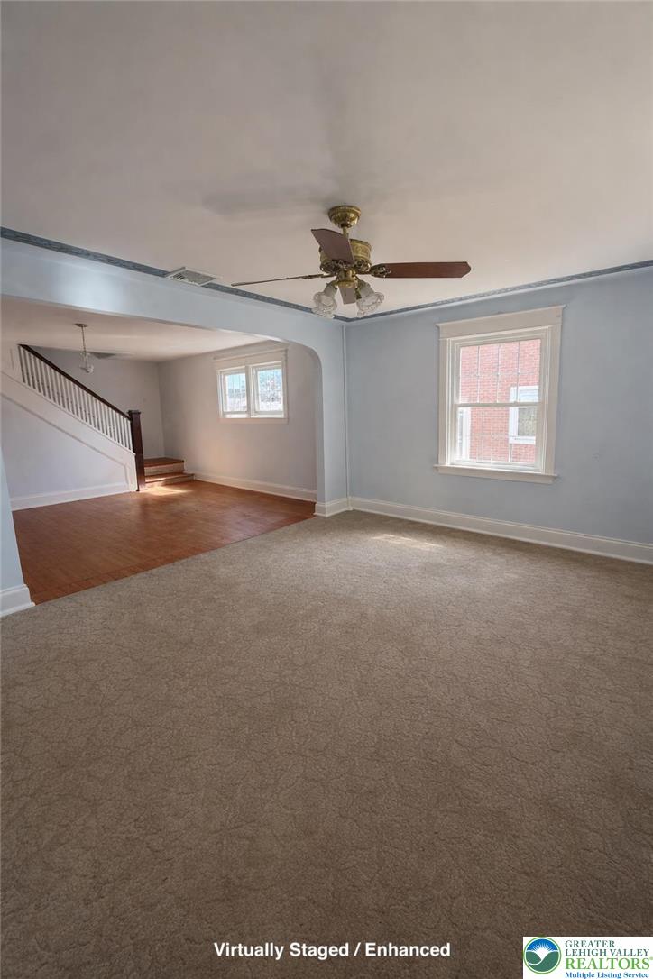 935 Easton Road Hellertown, PA 18055 - Photo 6 of 29 a view of a livingroom with a ceiling fan and window
