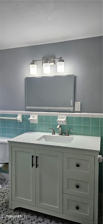 2544 First Street, Unit 202 Fort Myers, FL 33901 - Photo 18 of 20 a bathroom with a sink and a mirror