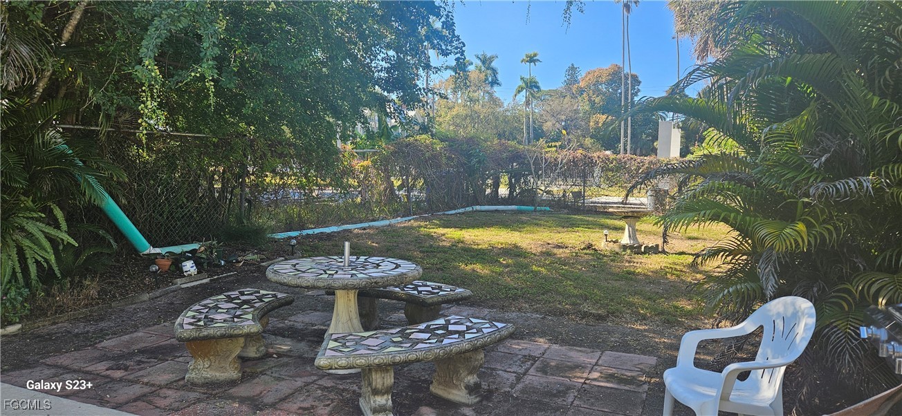 2544 First Street, Unit 202 Fort Myers, FL 33901 - Photo 20 of 20 a view of a garden with furniture