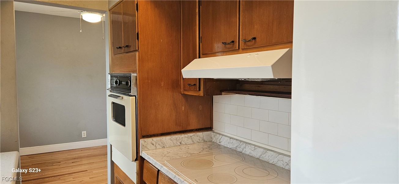 2544 First Street, Unit 202 Fort Myers, FL 33901 - Photo 10 of 20 a bathroom with a sink and a mirror
