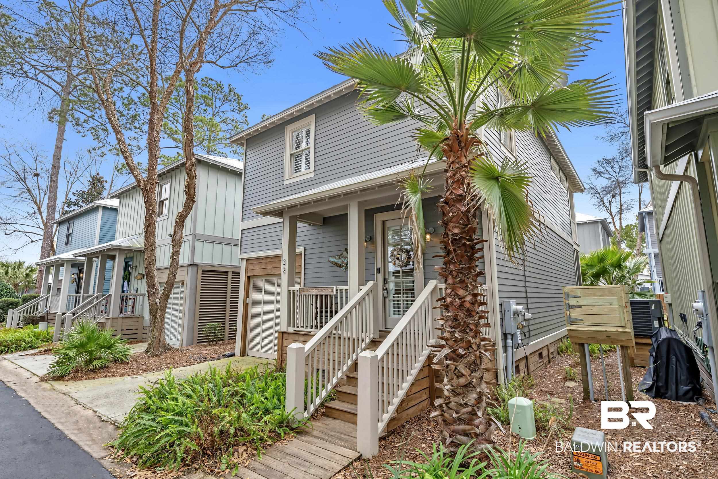 25773 Canal Road, Unit 32 Orange Beach, AL 36561 - Photo 1 of 35 View of front of home featuring a garage