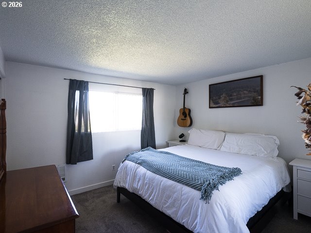 14655 Southwest 76th Avenue, Unit 2 Portland, OR 97224 - Photo 18 of 31 Primary Bedroom