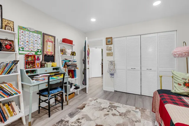 a view of a workspace with furniture