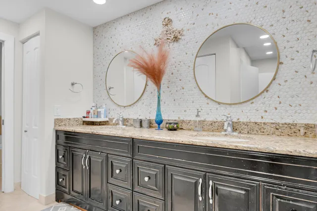 a bathroom with a shower a toilet and a shower