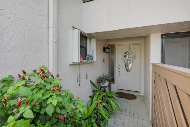 a flower pot with wooden floor