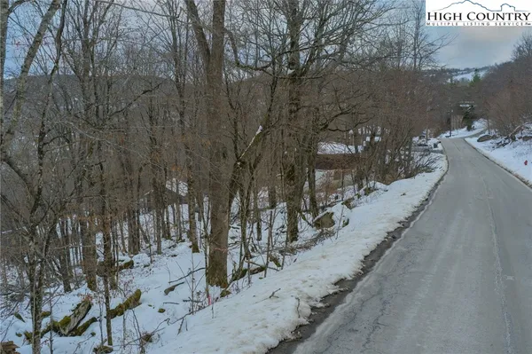 a view of a backyard of the house