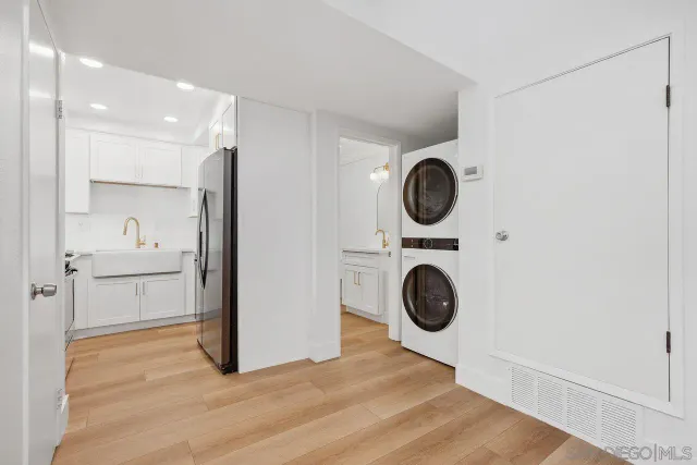 a view of kitchen and wooden floor