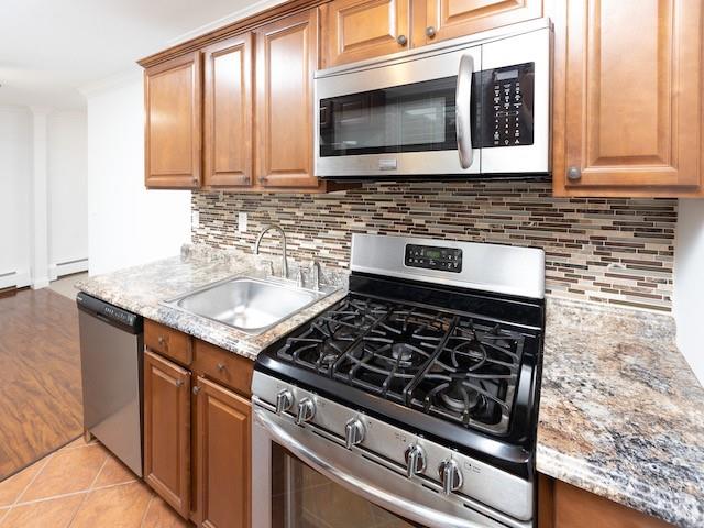 16 Tanager Road, Unit 1606 Monroe, NY 10950 - Photo 1 of 1 a kitchen with granite countertop a stove sink and microwave