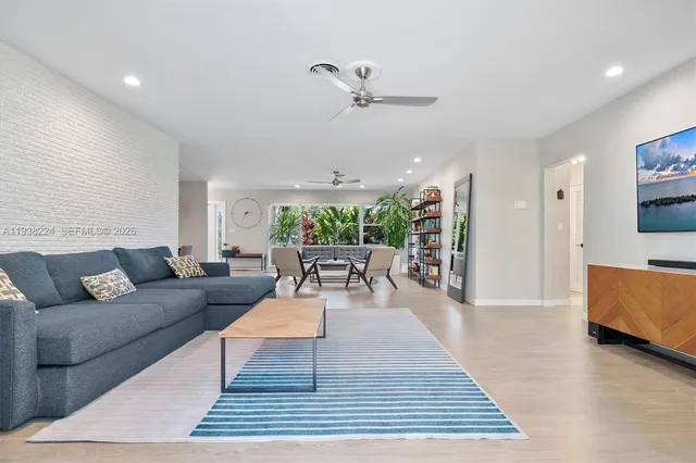 a kitchen that has a sink and a stove